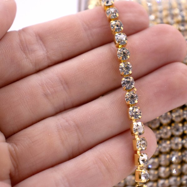 Encontraproduto.com.br - CORRENTE DE STRASS JUNTA SS18 EM VIDRO COM 25 METROS