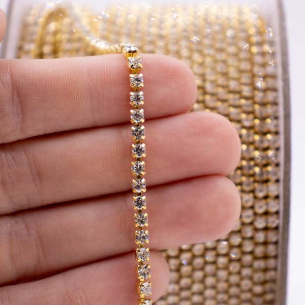 Encontraproduto.com.br - CORRENTE DE STRASS JUNTA SS12 EM VIDRO COM 50 METROS