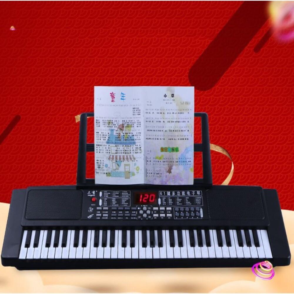 Encontraproduto.com.br - TECLADO PIANO ELETRONICO 61 TECLAS COM PARTITURA PROFISSIONAL USB
