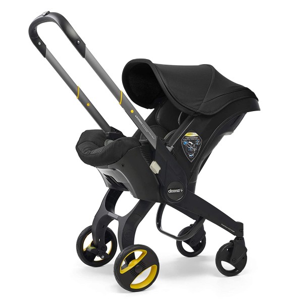 Encontraproduto.com.br - Doona Cadeirinha de Bebê para Auto 2 em 1 Se Torna um Carrinho Em Segundos Preto