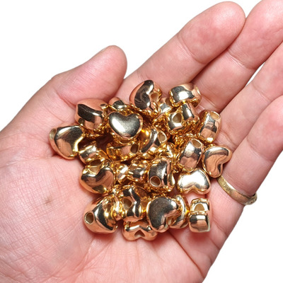 Encontraproduto.com.br - ENTREMEIO CORAÇAO LISO 12X14MM EM ABS COM 250GR