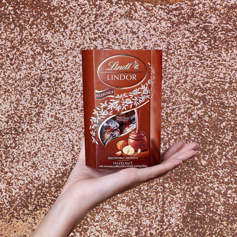 Encontraproduto.com.br - Trufas de Chocolate ao Leite Com Avelãs e Recheio Cremoso Lindt 200g